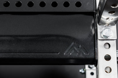 Close-up of mountain branding on the stamped REP Logo Plate Crossmember 2.0